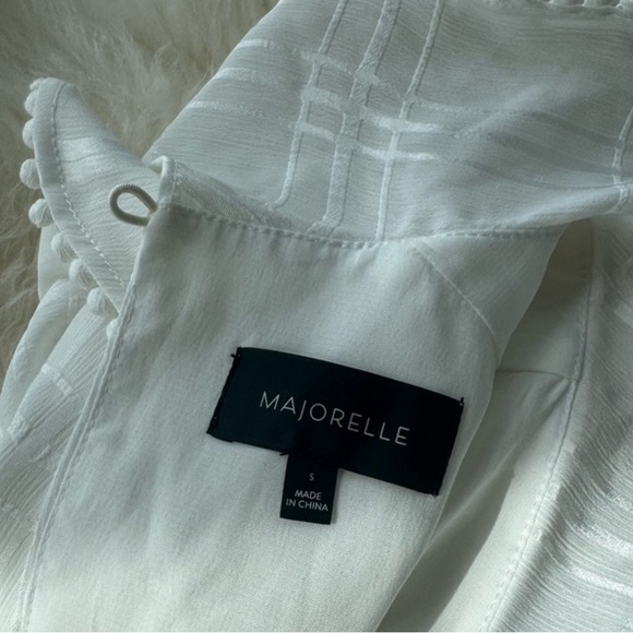 NEVER WORN - Enzo Romper
MAJORELLE
Color: Ivory
Size: S
MAJORELLE - Picture 10 of 12
